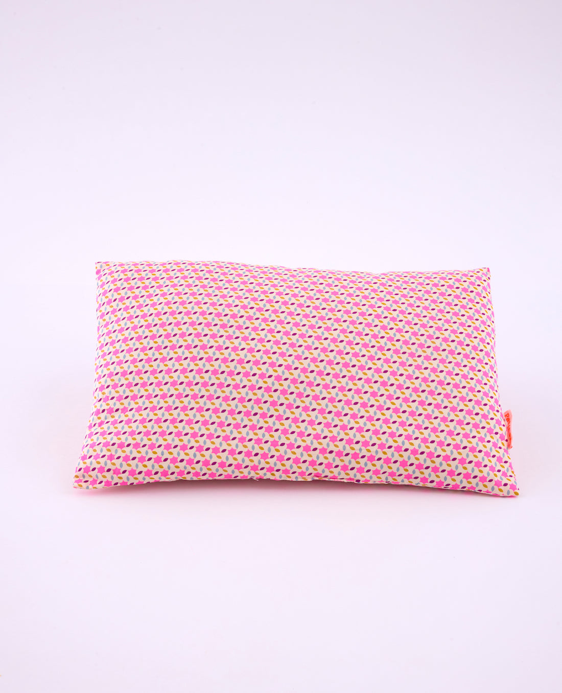 Coussin Moussem rose avec des motifs arrondis