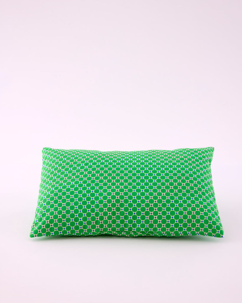 Coussin Mimoun vert avec des motifs géométriques arrondis