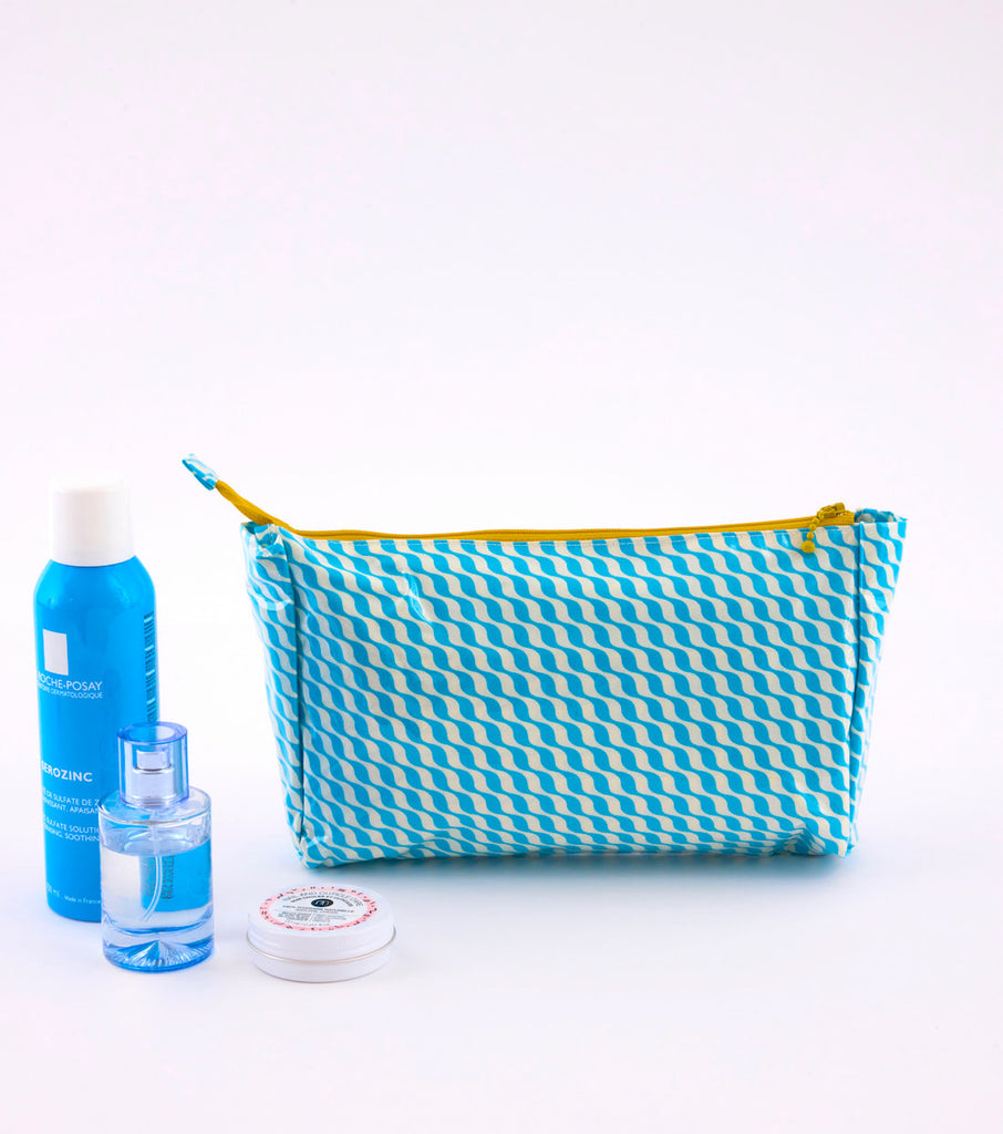 Petite trousse de toilette Kifkif bleu avec des motifs ondulés 