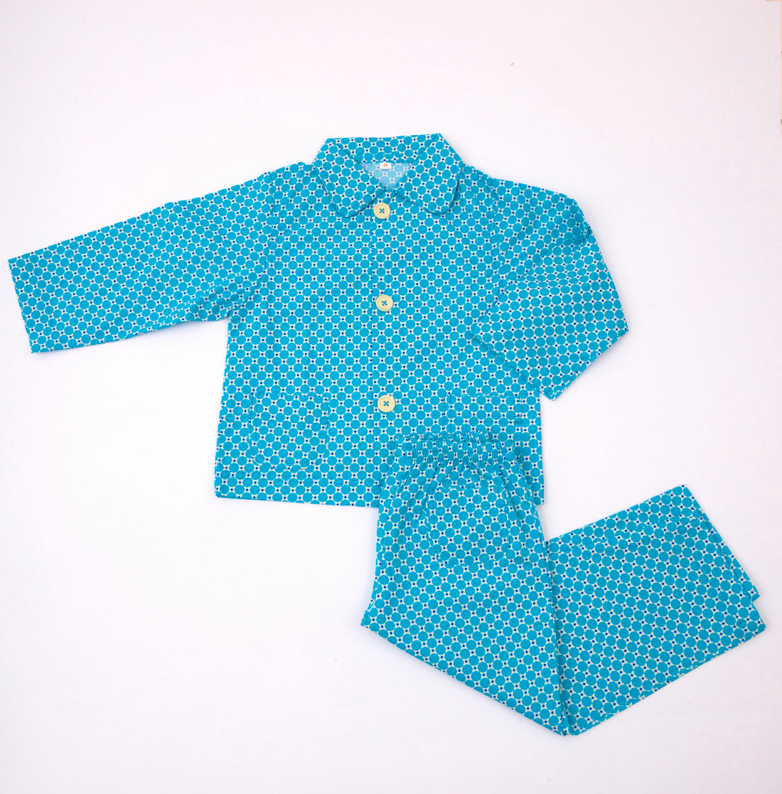 Pyjama Mimoun bleu avec des motifs géométriques arrondis