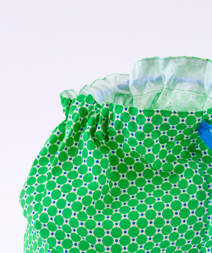 Sac de piscine Mimoun vert avec des motifs géométriques arrondis