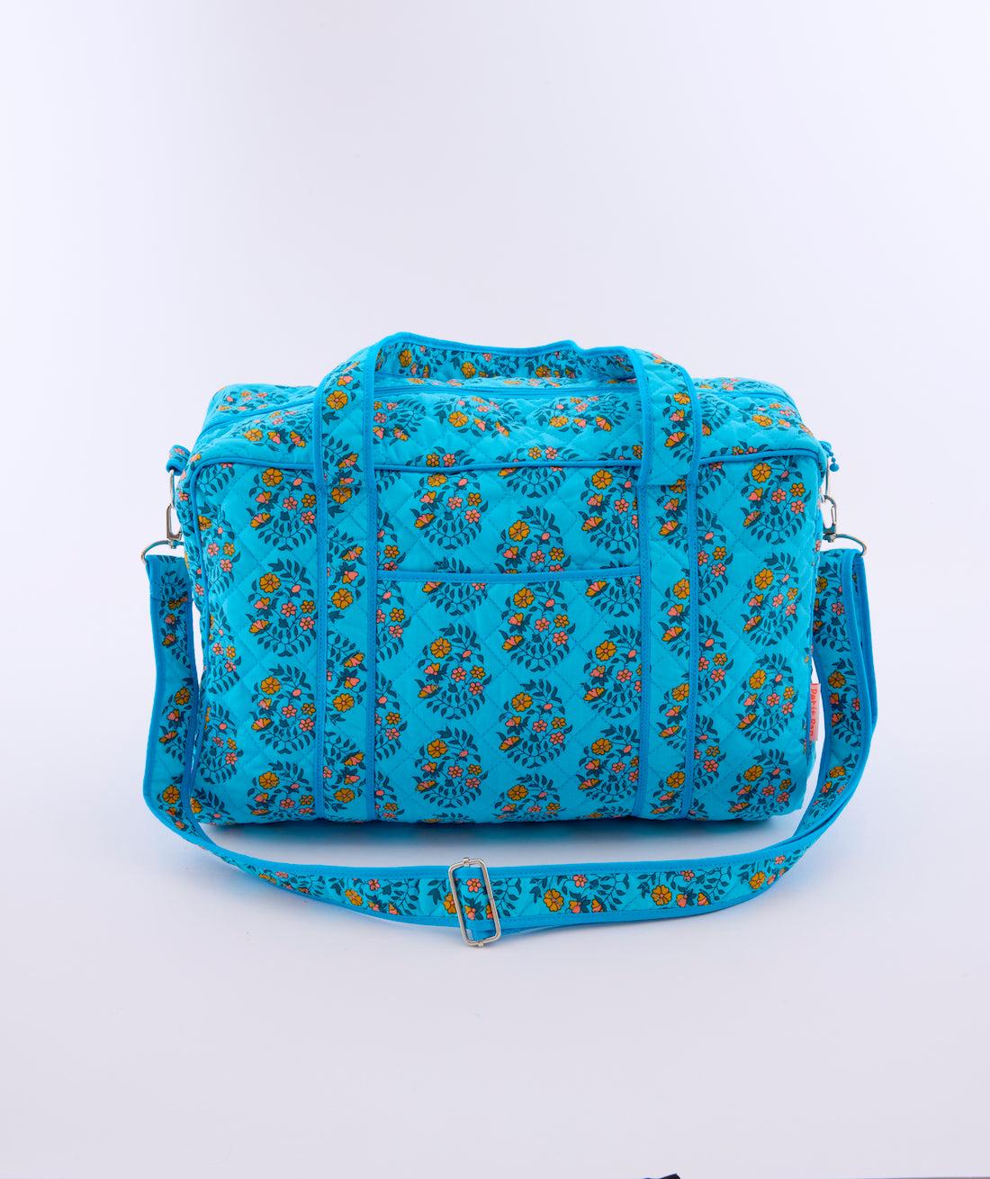 Sac maman Shalin turquoise avec des motifs fleuris