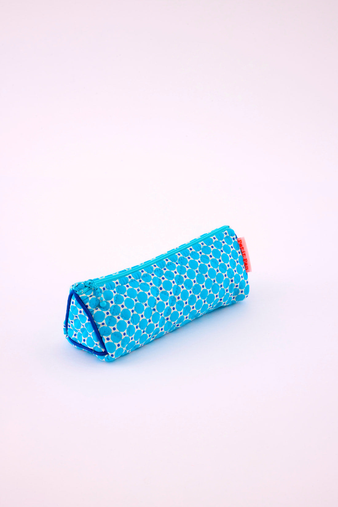 Trousse école Mimoun bleu avec des motifs géométriques arrondis 