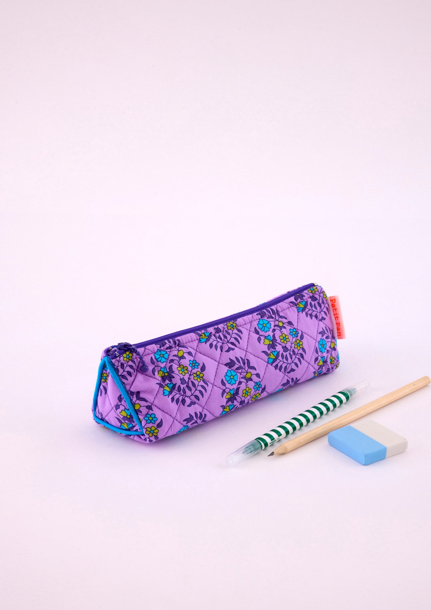 Trousse école Shalin lilas avec des motifs fleuris