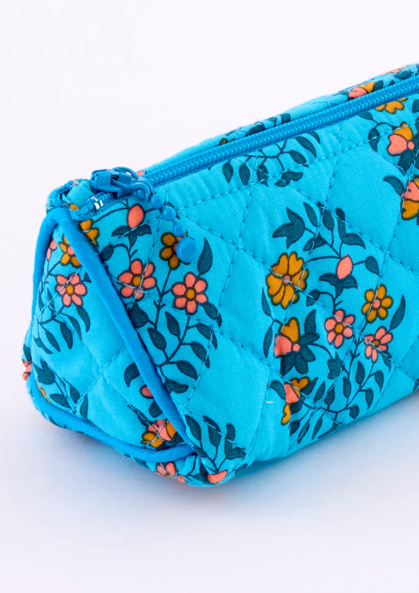 Trousse école Shalin turquoise avec des motifs fleuris